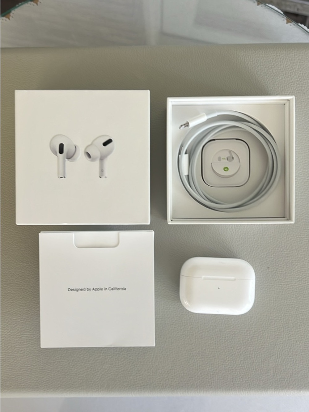 Apple AirPods Pro with charging cord